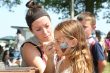 girl getting face painted