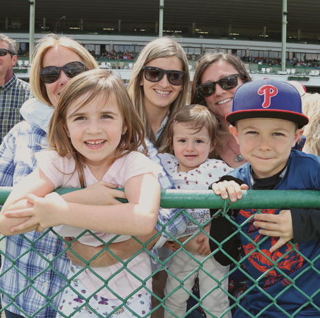 mothers and children posing for camera