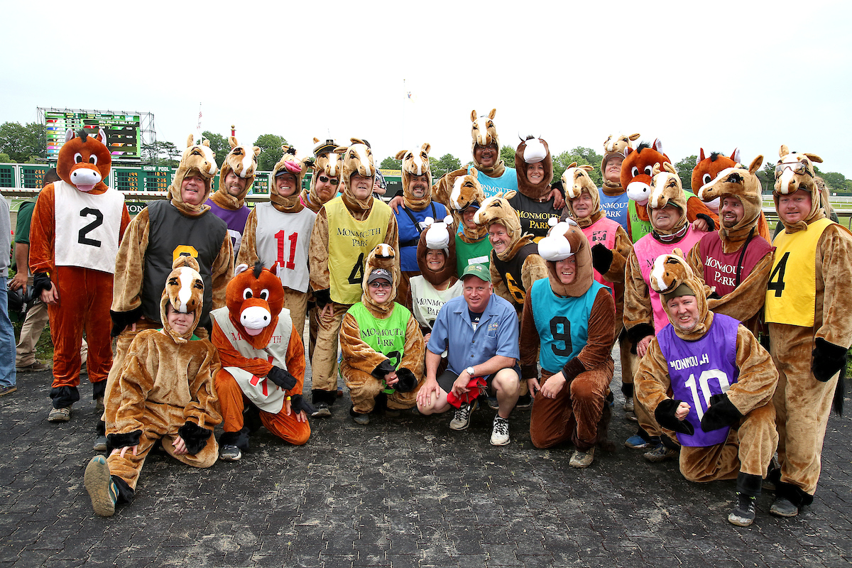 people in horse costumes